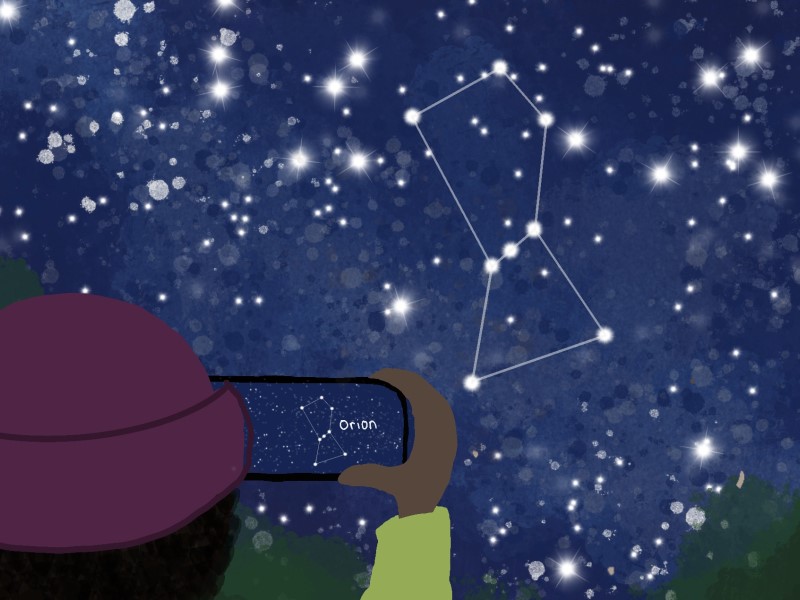 person using stargazing app as a tool when exploring the outdoors
